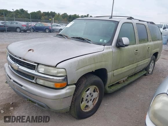 ✅ 2004 Chevrolet Suburban LT • VIN: 1GNFK16Z84J296909 • Lot: 43203625. Listed on IAAI with 318,299 mi. Free auction sales archive from the USA and detailed vehicle history report at DreamBid. Image 2.