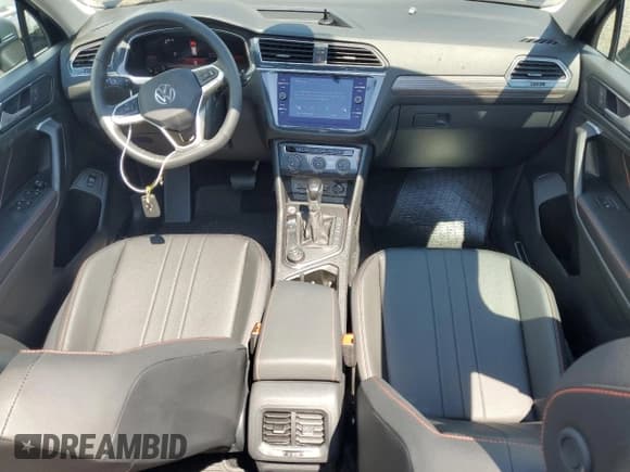 ✅ 2024 Volkswagen Tiguan Wolfsburg Edition • VIN: 3VVAB7AX2RM229276 • Lot: 60845445. Listed on Copart with 859 mi. Free auction sales archive from the USA and detailed vehicle history report at DreamBid. Image 8.