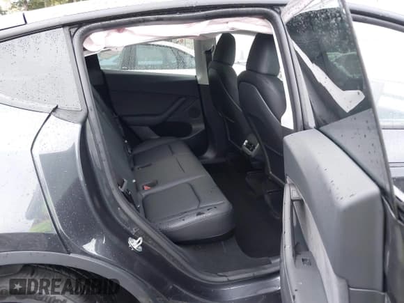 ✅ 2025 Tesla Model Y Long Range • VIN: 7SAYGDED5SF258801 • Лот: 43623000. Опубликован ранее на IAAI с пробегом 7 124 миль. Бесплатный доступ к архиву аукционных продаж из США и подробный отчёт об истории автомобиля на DreamBid. Изображение 21.