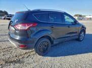 ✅ 2014 Ford Escape Titanium • VIN: 1FMCU9J93EUE05252 • Lot: 94070425. Wystawiony na Copart z przebiegiem 229 837 mil. Bezpłatny archiwum sprzedaży aukcyjnych z USA i szczegółowy raport historii pojazdu na DreamBid. Zdjęcie 3.