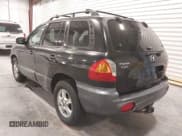 ✅ 2004 Hyundai Santa Fe GLS • VIN: KM8SC73E74U654567 • Lot: 43571152. Listed on IAAI with 167,999 mi. Free auction sales archive from the USA and detailed vehicle history report at DreamBid. Image 3.