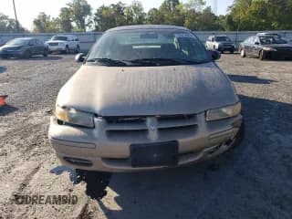 ✅ 1999 Dodge Stratus • VIN: 1B3EJ46X0XN684268 • Lot: 70312664. Listed on Copart with 140,711 mi. Free auction sales archive from the USA and detailed vehicle history report at DreamBid. Image 5.