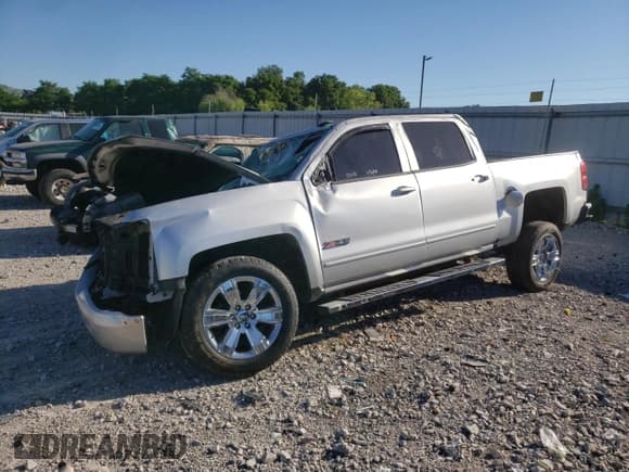 ✅ 2018 Chevrolet Silverado 1500 LT • VIN: 3GCUKREC1JG471106 • Лот: 58884434. Опубликован ранее на Copart с пробегом Не указан. Бесплатный доступ к архиву аукционных продаж из США и подробный отчёт об истории автомобиля на DreamBid. Изображение 1.