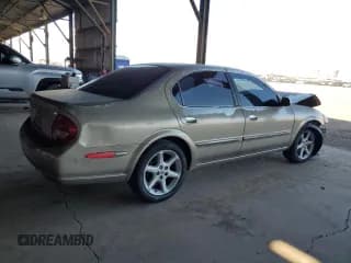 ✅ 2000 Nissan Maxima GXE • VIN: JN1CA31D7YT537328 • Лот: 69280624. Опубликован ранее на Copart с пробегом 250 429 миль. Бесплатный доступ к архиву аукционных продаж из США и подробный отчёт об истории автомобиля на DreamBid. Изображение 3.