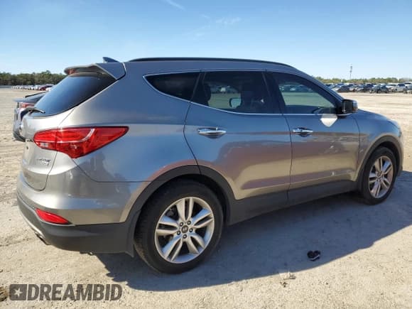 ✅ 2015 Hyundai Santa Fe • VIN: 5XYZW4LA0FG252772 • Лот: 38169243. Опубликован ранее на Copart с пробегом 53 507 миль. Бесплатный доступ к архиву аукционных продаж из США и подробный отчёт об истории автомобиля на DreamBid. Изображение 3.