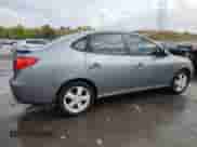 2010 Hyundai Elantra GLS with VIN KMHDU4ADXAU090746, listed as a Copart auction lot 85524235 with 118,299 mi miles and Salvage title. Bid and sale history available at DreamBid. Image 3.