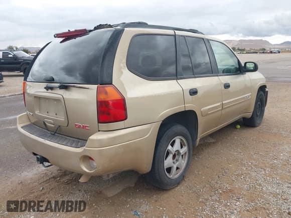 ✅ 2004 GMC Envoy SLE • VIN: 1GKDS13S242367320 • Lot: 43741255. Listed on IAAI with 280,628 mi. Free auction sales archive from the USA and detailed vehicle history report at DreamBid. Image 4.