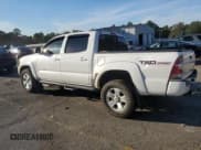 ✅ 2015 Toyota Tacoma PreRunner • VIN: 3TMJU4GNXFM185682 • Lot: 90259825. Listed on Copart with 125,204 mi. Free auction sales archive from the USA and detailed vehicle history report at DreamBid. Image 2.