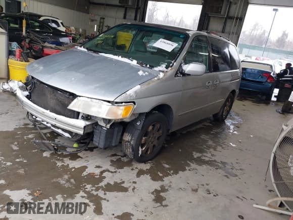 ✅ 2002 Honda Odyssey EX • VIN: 2HKRL18692H524444 • Lot: 43868896. Listed on IAAI with 257,416 mi. Free auction sales archive from the USA and detailed vehicle history report at DreamBid. Image 2.
