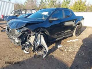 2024 Hyundai Santa Cruz Night Edition with VIN 5NTJCDAFXRH078437, listed as a IAAI auction lot 41292656 with 21,842 mi miles and . Bid and sale history available at DreamBid. Image 2.