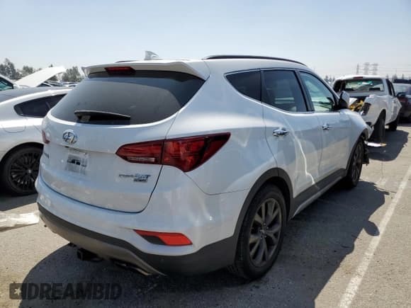 ✅ 2017 Hyundai Santa Fe Ultimate • VIN: 5XYZW4LA8HG448493 • Лот: 48143503. Опубликован ранее на Copart с пробегом 88 780 миль. Бесплатный доступ к архиву аукционных продаж из США и подробный отчёт об истории автомобиля на DreamBid. Изображение 3.