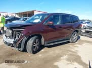 ✅ 2017 Honda Pilot EX-L • VIN: 5FNYF5H70HB019337 • Lot: 40809133. Listed on IAAI with 98,102 mi. Free auction sales archive from the USA and detailed vehicle history report at DreamBid. Image 2.