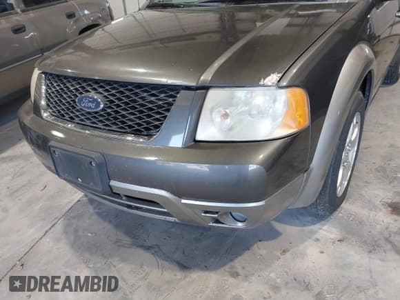 ✅ 2005 Ford Freestyle SEL • VIN: 1FMDK051X5GA72332 • Lot: 41826384. Wystawiony na IAAI z przebiegiem 171 719 mil. Bezpłatny archiwum sprzedaży aukcyjnych z USA i szczegółowy raport historii pojazdu na DreamBid. Zdjęcie 6.