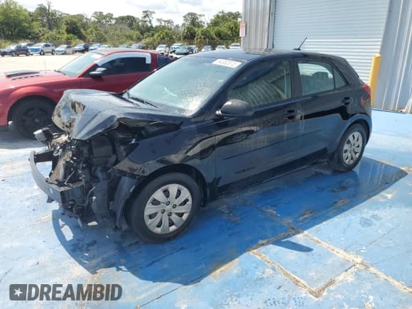 ✅ 2018 Kia Rio LX • VIN: 3KPA25AB8JE065263 • Lot: 54352075. Listed on Copart with 195,269 mi. Free auction sales archive from the USA and detailed vehicle history report at DreamBid. Image 1.