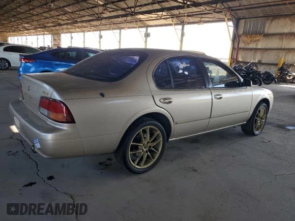 ✅ 1998 Nissan Maxima GXE • VIN: JN1CA21DXWT527738 • Lot: 57276725. Listed on Copart with 109,453 mi. Free auction sales archive from the USA and detailed vehicle history report at DreamBid. Image 3.