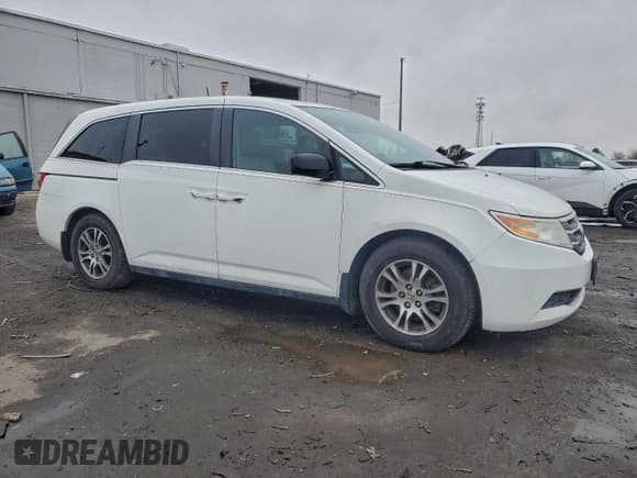 ✅ 2013 Honda Odyssey EX-L • VIN: 5FNRL5H64DB076316 • Lot: 95239825. Listed on Copart with 134,128 mi. Free auction sales archive from the USA and detailed vehicle history report at DreamBid. Image 4.
