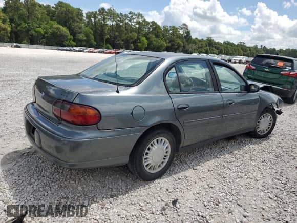 2003 Chevrolet Malibu with VIN 1G1ND52J23M632775, listed as a Copart auction lot 60918574 with 49,163 mi miles and Salvage title. Bid and sale history available at DreamBid. Image 3.