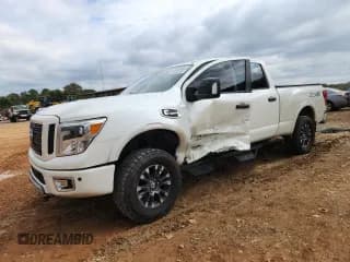 ✅ 2018 Nissan Titan Pro-4X • VIN: 1N6BA1F42JN515203 • Lot: 82353085. Wystawiony na Copart z przebiegiem 71 619 mil. Bezpłatny archiwum sprzedaży aukcyjnych z USA i szczegółowy raport historii pojazdu na DreamBid. Zdjęcie 1.