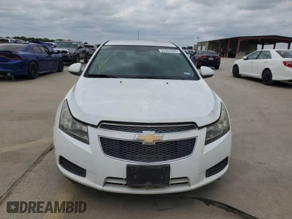 2012 Chevrolet Cruze 1FL z VIN 1G1PE5SC7C7103957, wystawiony jako Copart lot #69062924 z przebiegiem 161 022 mil mil oraz Czysty tytuł • Clean title. Historia ofert i sprzedaży dostępna na DreamBid. Obrazek 5.