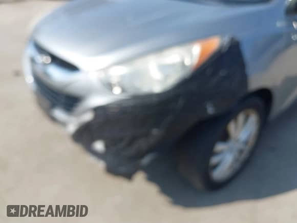 2010 Hyundai Tucson GLS with VIN KM8JUCAC2AU078658, listed as a IAAI auction lot 41726534 with 140,155 mi miles and . Bid and sale history available at DreamBid. Image 6.