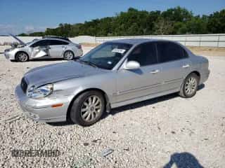 2004 Hyundai Sonata GLS with VIN KMHWF35H24A000585, listed as a Copart auction lot 59238264 with 119,864 mi miles and Salvage title. Bid and sale history available at DreamBid. Image 1.