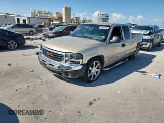 2004 GMC Sierra 1500 SLE with VIN 2GTEC19V641136466, listed as a Copart auction lot 70005885 with 314,447 mi miles and Salvage title. Bid and sale history available at DreamBid. Image 1.
