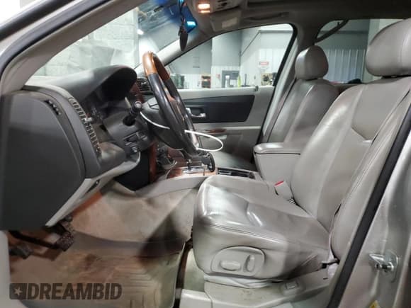 ✅ 2006 Cadillac SRX • VIN: 1GYEE63A660210037 • Лот: 79623534. Опубликован ранее на Copart с пробегом 193 107 миль. Бесплатный доступ к архиву аукционных продаж из США и подробный отчёт об истории автомобиля на DreamBid. Изображение 7.