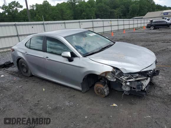 2023 Toyota Camry Hybrid LE with VIN 4T1C31AK6PU609392, listed as a Copart auction lot 61189365 with 134,257 mi miles and Clean title. Bid and sale history available at DreamBid. Image 4.