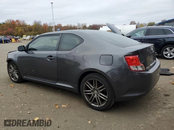 ✅ 2013 Scion tC • VIN: JTKJF5C77D3049623 • Лот: 90361985. Опубликован ранее на Copart с пробегом 188 411 миль. Бесплатный доступ к архиву аукционных продаж из США и подробный отчёт об истории автомобиля на DreamBid. Изображение 2.