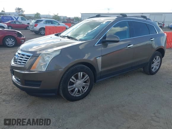 ✅ 2014 Cadillac SRX • VIN: 3GYFNAE31ES556252 • Lot: 43317021. Wystawiony na IAAI z przebiegiem 162 882 mil. Bezpłatny archiwum sprzedaży aukcyjnych z USA i szczegółowy raport historii pojazdu na DreamBid. Zdjęcie 2.