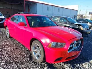 ✅ 2014 Dodge Charger SE • VIN: 2C3CDXBGXEH238076 • Lot: 43579143. Listed on IAAI with 184,503 mi. Free auction sales archive from the USA and detailed vehicle history report at DreamBid. Image 1.