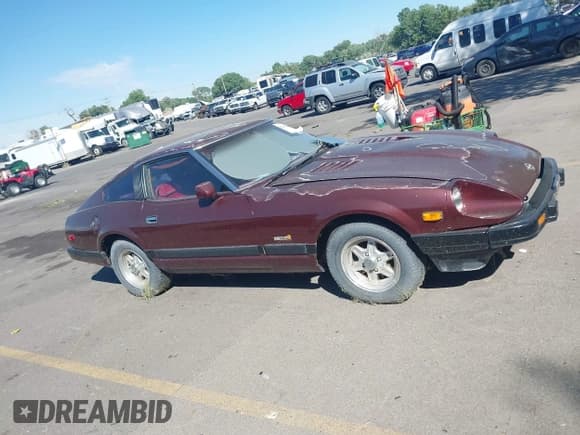 ✅ 1982 Datsun 280ZX • VIN: JN1HZ04S9CX455903 • Lot: 42465455. Wystawiony na IAAI z przebiegiem Nie podano. Bezpłatny archiwum sprzedaży aukcyjnych z USA i szczegółowy raport historii pojazdu na DreamBid. Zdjęcie 13.