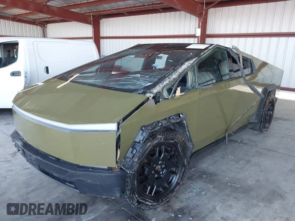 ✅ 2024 Tesla Cybertruck • VIN: 7G2CEHED0RA006320 • Lot: 42956257. Listed on IAAI with 28,757 mi. Free auction sales archive from the USA and detailed vehicle history report at DreamBid. Image 2.