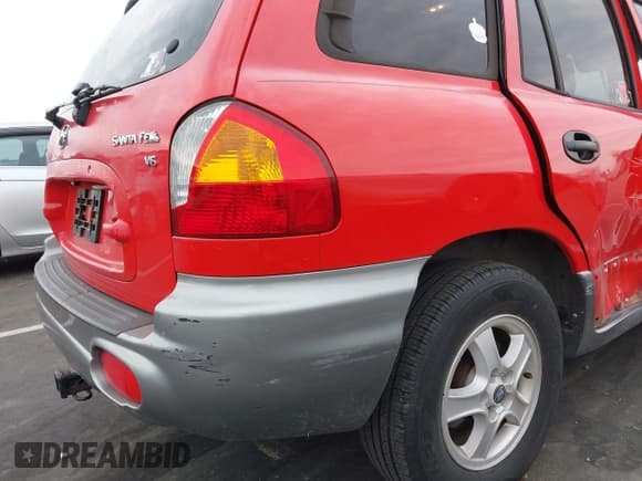 ✅ 2004 Hyundai Santa Fe GLS • VIN: KM8SC13D54U737192 • Lot: 43079988. Listed on IAAI with 208,616 mi. Free auction sales archive from the USA and detailed vehicle history report at DreamBid. Image 12.