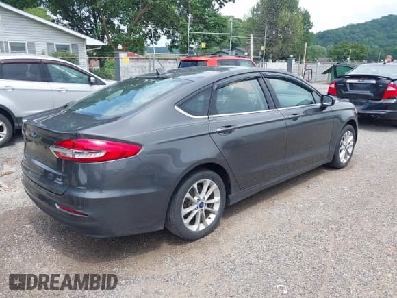 ✅ 2020 Ford Fusion SE • VIN: 3FA6P0LU7LR232500 • Lot: 42590897. Listed on IAAI with 58,971 mi. Free auction sales archive from the USA and detailed vehicle history report at DreamBid. Image 4.
