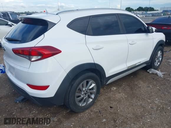 2018 Hyundai Tucson SEL with VIN KM8J33A44JU655654, listed as a IAAI auction lot 42590409 with 130,295 mi miles and . Bid and sale history available at DreamBid. Image 4.