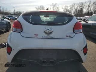 ✅ 2014 Hyundai Veloster Turbo • VIN: KMHTC6AE6EU198211 • Lot: 82399664. Wystawiony na Copart z przebiegiem 117 681 mil. Bezpłatny archiwum sprzedaży aukcyjnych z USA i szczegółowy raport historii pojazdu na DreamBid. Zdjęcie 6.