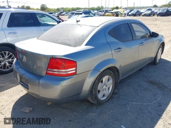 ✅ 2010 Dodge Avenger SXT • VIN: 1B3CC4FB2AN203322 • Lot: 43564507. Listed on IAAI with 203,277 mi. Free auction sales archive from the USA and detailed vehicle history report at DreamBid. Image 4.