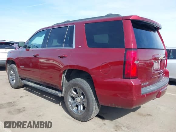 ✅ 2018 Chevrolet Tahoe LT • VIN: 1GNSKBKC0JR213007 • Lot: 41613263. Listed on IAAI with 137,537 mi. Free auction sales archive from the USA and detailed vehicle history report at DreamBid. Image 3.