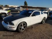 ✅ 2007 Ford Mustang Deluxe • VIN: 1ZVHT80N475210616 • Lot: 43895736. Listed on IAAI with 205,099 mi. Free auction sales archive from the USA and detailed vehicle history report at DreamBid. Image 2.