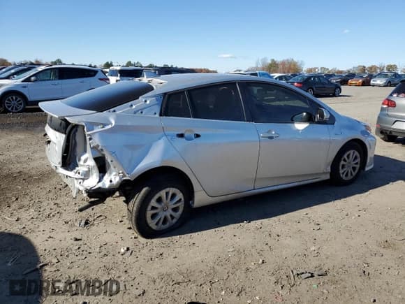 ✅ 2021 Toyota Prius L Eco • VIN: JTDKAMFU6M3142302 • Лот: 92061595. Опубликован ранее на Copart с пробегом 170 784 миль. Бесплатный доступ к архиву аукционных продаж из США и подробный отчёт об истории автомобиля на DreamBid. Изображение 3.