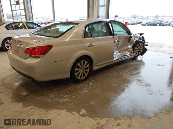 ✅ 2012 Toyota Avalon • VIN: 4T1BK3DB9CU458919 • Lot: 41064363. Listed on IAAI with 156,665 mi. Free auction sales archive from the USA and detailed vehicle history report at DreamBid. Image 4.