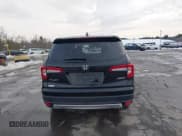 ✅ 2020 Honda Pilot EX-L • VIN: 5FNYF6H50LB022798 • Lot: 41592012. Listed on IAAI with 67,045 mi. Free auction sales archive from the USA and detailed vehicle history report at DreamBid. Image 16.