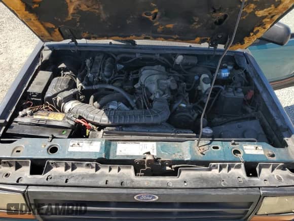 1994 Ford Explorer Eddie Bauer z VIN 1FMCU22X6RUB20958, wystawiony jako Copart lot #80114745 z przebiegiem 3 428 mil mil oraz Szkoda całkowita • Salvage title. Historia ofert i sprzedaży dostępna na DreamBid. Obrazek 11.