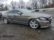 ✅ 2012 Mercedes-Benz CLS 550 • VIN: WDDLJ7DB6CA023821 • Lot: 93572115. Listed on Copart with 101,472 mi. Free auction sales archive from the USA and detailed vehicle history report at DreamBid. Image 4.