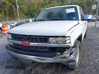 2000 Chevrolet Silverado 1500 LS z VIN 2GCEK19T8Y1280401, wystawiony jako IAAI lot #43335240 z przebiegiem 286 458 mil mil oraz . Historia ofert i sprzedaży dostępna na DreamBid. Obrazek 6.