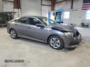 ✅ 2017 Honda Civic LX • VIN: 19XFC2F57HE230542 • Lot: 93558545. Wystawiony na Copart z przebiegiem 49 922 mil. Bezpłatny archiwum sprzedaży aukcyjnych z USA i szczegółowy raport historii pojazdu na DreamBid. Zdjęcie 4.