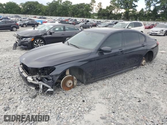 ✅ 2019 BMW 7 Series 740i • VIN: WBA7E2C5XKB218552 • Lot: 61473145. Listed on Copart with 108,440 mi. Free auction sales archive from the USA and detailed vehicle history report at DreamBid. Image 1.