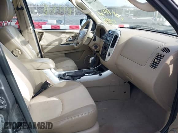 2006 Mercury Mariner Luxury с VIN 4M2YU57136DJ05176, выставлен на аукционе IAAI как лот 41499648 с пробегом 152 185 миль миль и . История ставок и продаж доступна на DreamBid. Изображение 5.