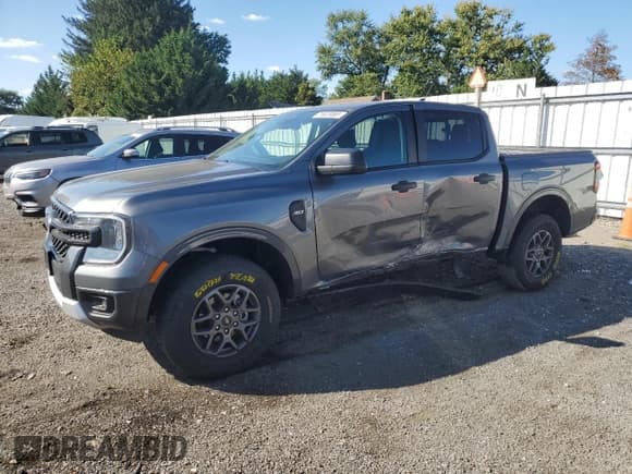 ✅ 2024 Ford Ranger XLT • VIN: 1FTER4HH1RLE59935 • Lot: 71023065. Listed on Copart with 23,430 mi. Free auction sales archive from the USA and detailed vehicle history report at DreamBid. Image 1.